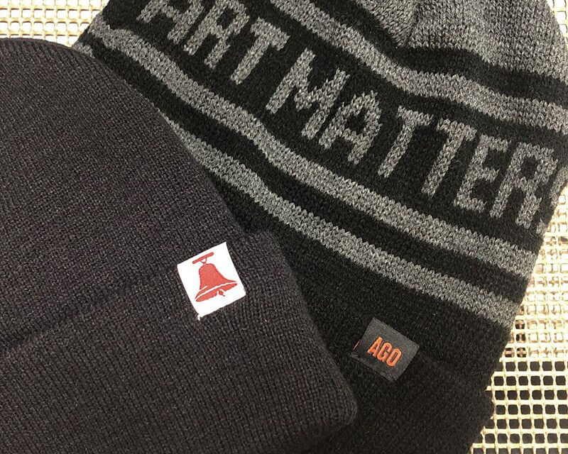 A custom woven label sewn on a hat.