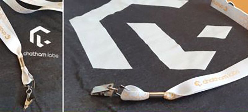 A t-shirt and lanyard customized with logo, great for tradeshows.